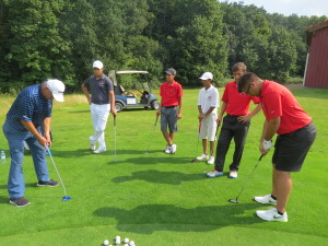 UAE National Players receiving a putting lesson from putting specialist Wiestaw Kramski